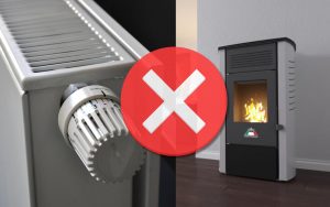 Stufa a pellet, calorifero e "X" in primo piano