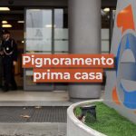 Sede Agenzia Entrate e scritta "Pignoramento prima casa"