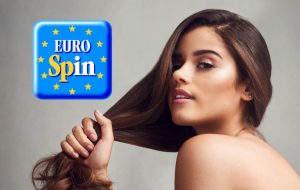 Donna che si tiene la chioma e logo Eurospin