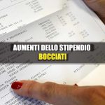 Scritta: "Bocciati gli aumenti in busta paga" su sfondo di una busta paga