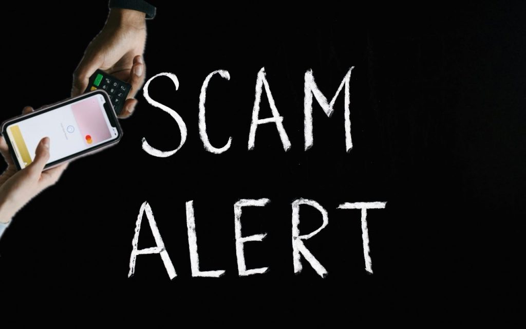 scam allert scritta