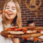 mangiare la pizza - freepik - circuitolavoro.it
